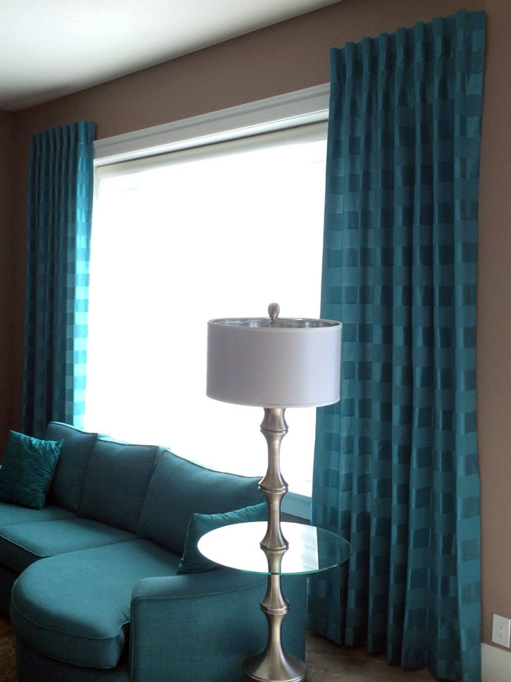 An example of a custom drapes installation by Blind Infusion in a Calgary area home.